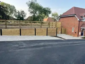 Timber fencing and tarmac driveway installation for new build property